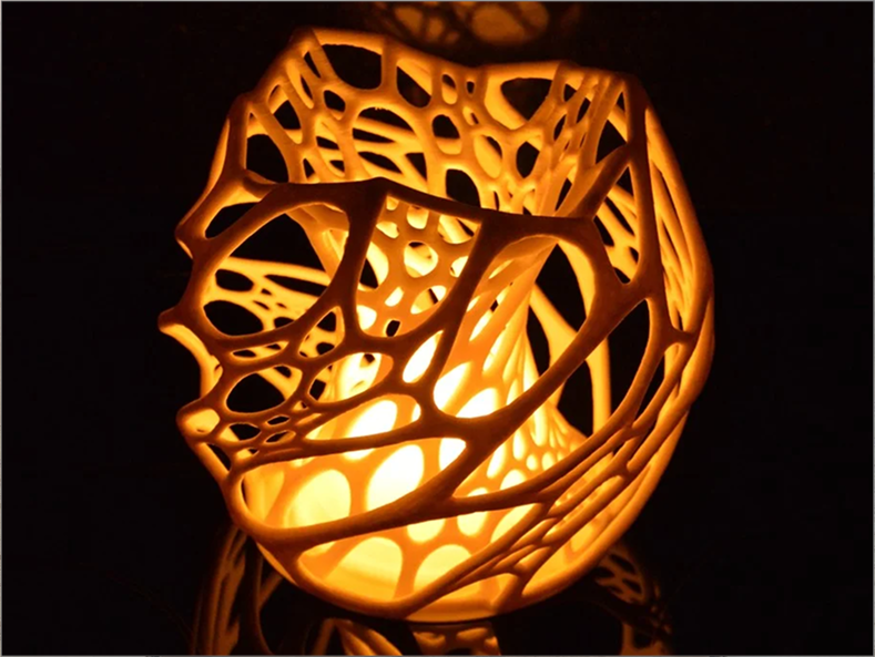 Photo of a cellular lamp diffuser found on thingiverse. When Looking for inspiration for 3D printed lamp diffusers, I stumbled into thingiverse and this design. The organic, wild shape leads me to want to consider further possabilities to play with the shape in a 3D modeling software.<a href'https://www.thingiverse.com/thing:1883446' target='_blank'><p>Link thingiverse project by StijnVanDamme</p></a>
